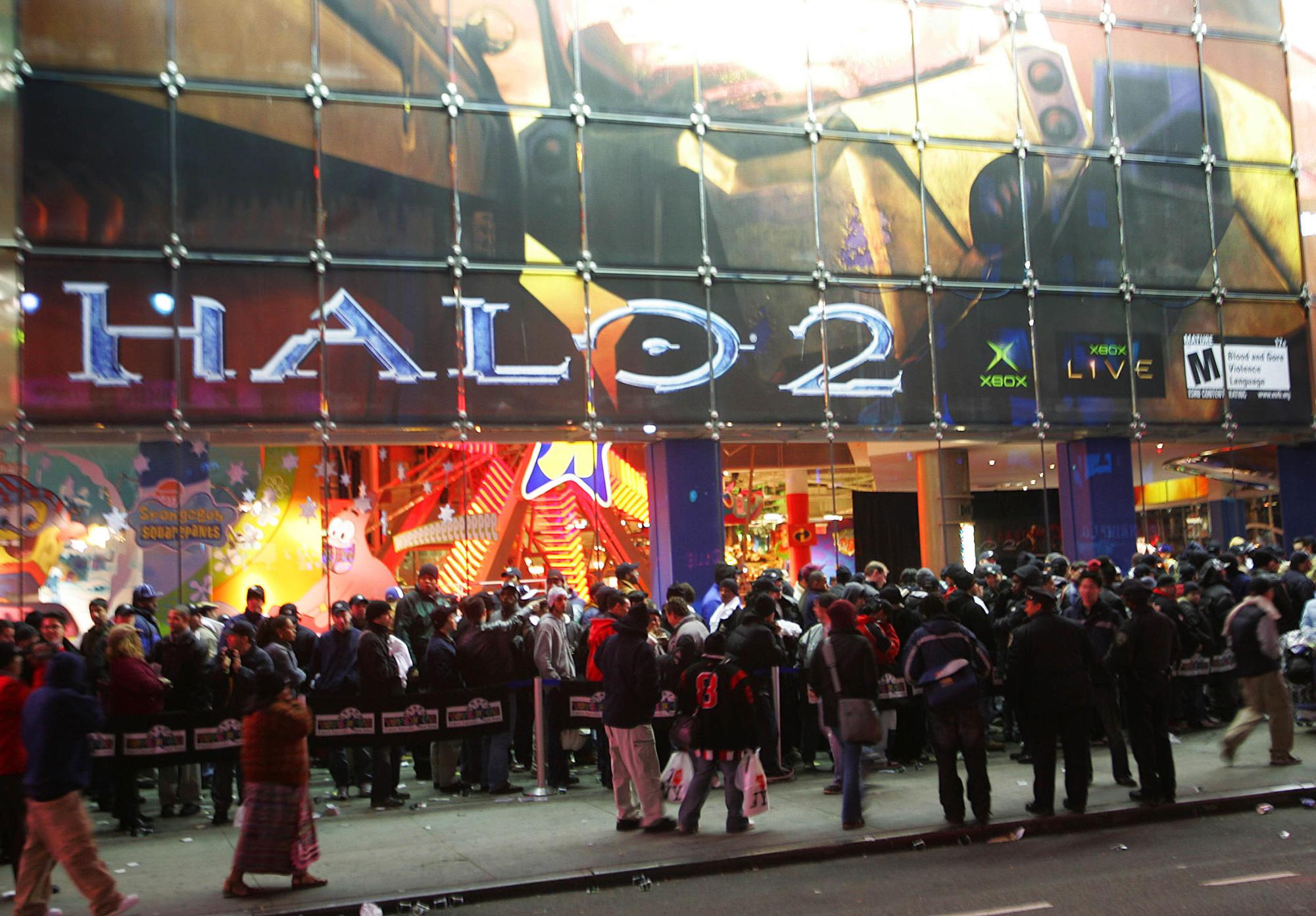 People Lined up outside of a Toys R Us waiting for the midnight release for Halo 2 